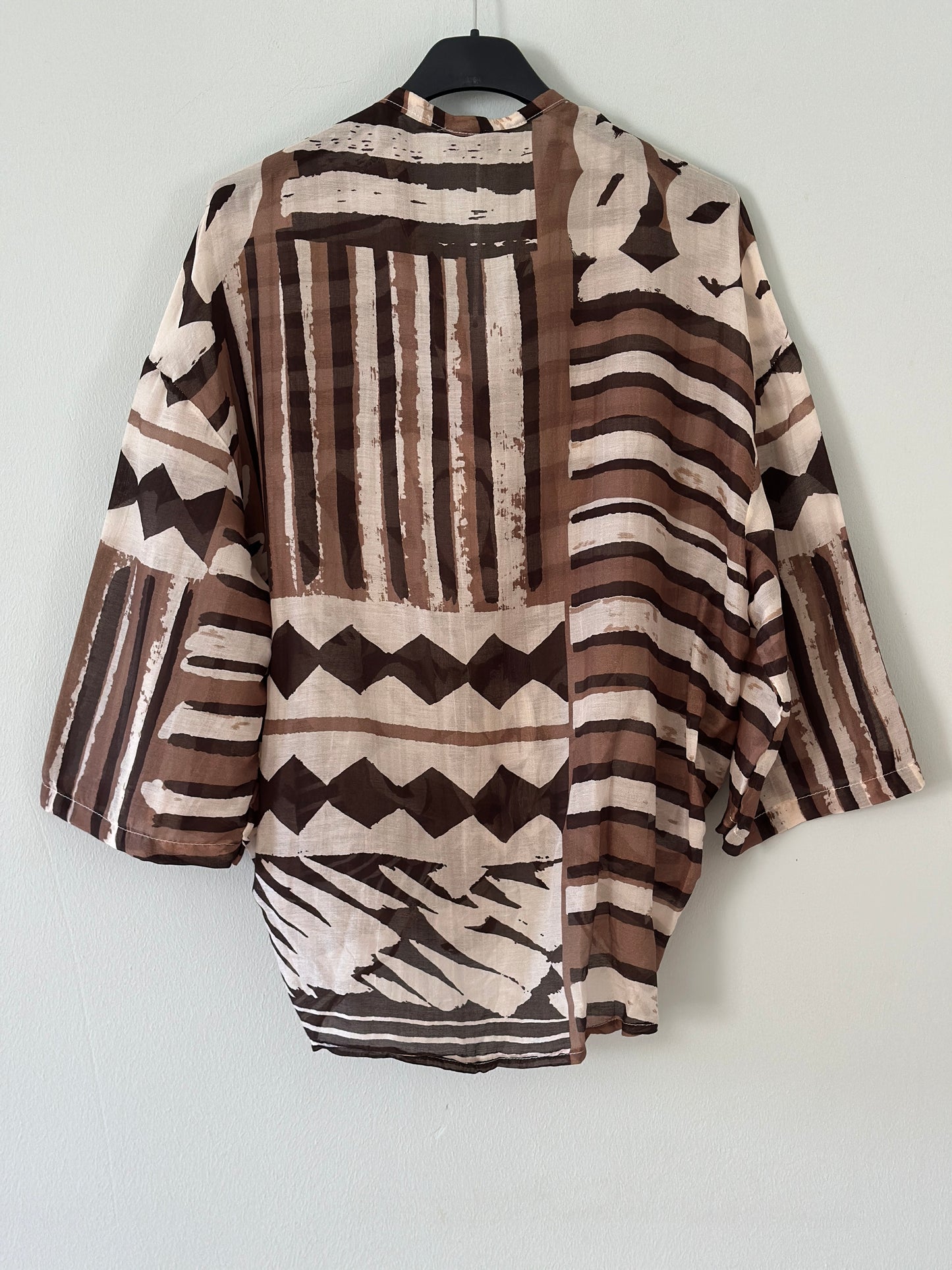 Blus ”Gudrun” med häftigt mönster - Brun