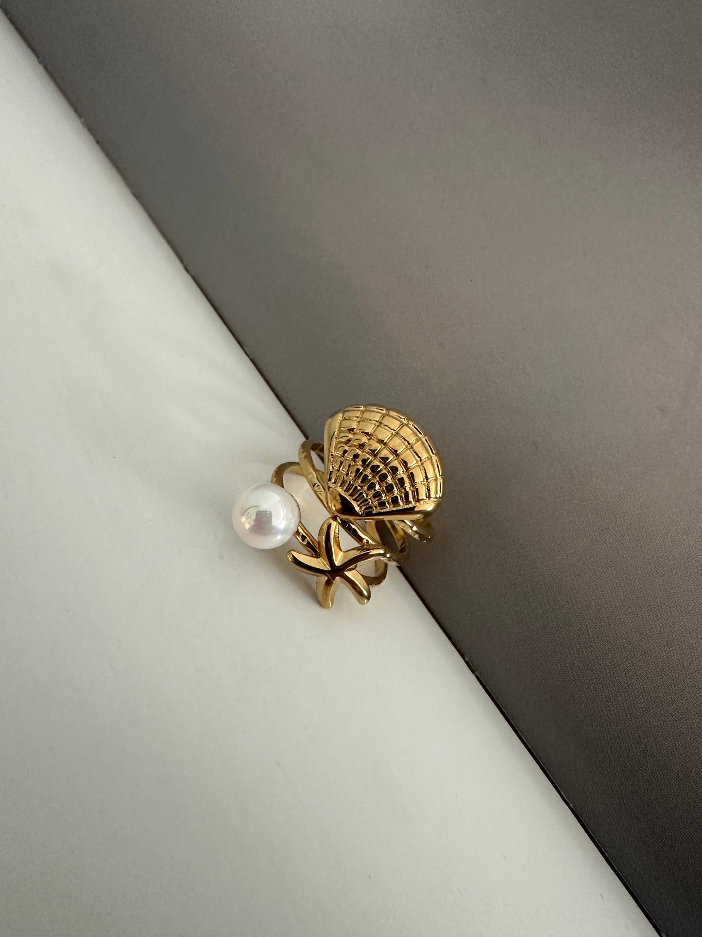 Justerbar ring med snäcka - Guld