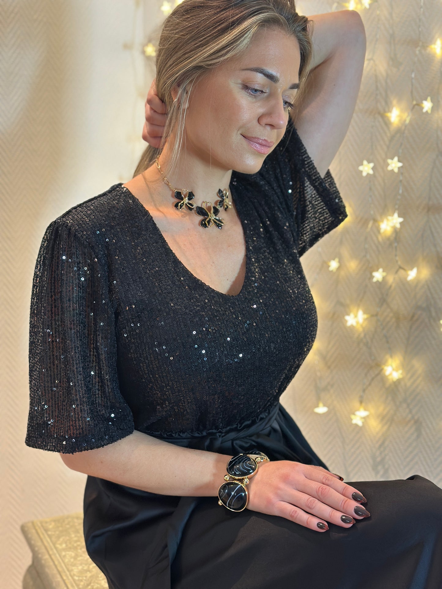 Glitterklänning med halvlång ärm - Svart