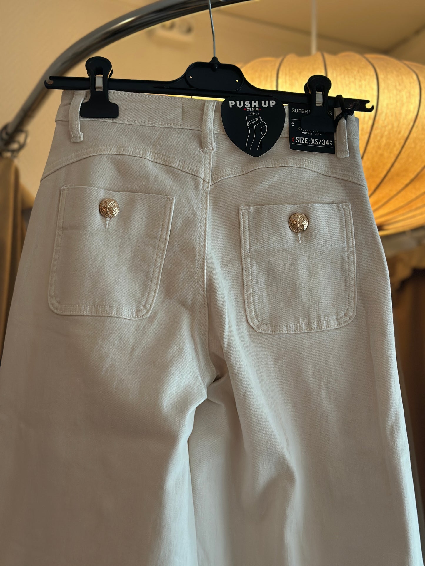 Jeans med rosettknappar - Beige